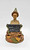 Cairn Studio, LTD Tom Clark Gnomes - Friday, detailed figurine of a woman with a humorous face, wearing a cone-shaped hat, sitting on a base with autumn leaves and the inscription 'Friday Clark'.
