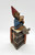 Cairn Studio, LTD Tom Clark Gnomes - Happy Birthday Cake Slice figurine, a gnome sitting on a cake slice holding a birthday cake, detailed and colorful sculpture.