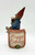 Cairn Studio, LTD Tom Clark Gnomes - Happy Birthday Cake Slice, a decorative gnome figurine holding a slice of birthday cake, sitting on a base with 'Happy Birthday' written on it in a cartoon style