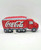 Coca-Cola 2002 Coca-Cola Truck Stuffed Toy, soft plush toy designed to resemble a vintage Coca-Cola delivery truck with red and white branding.