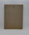 Disney Vintage 1967 Disney The Jungle Book Frame-Tray Puzzle, plain cardboard back side of the puzzle with a small hole at the top.