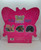 Ceaco 1000 Piece Butterfly Shaped Jigsaw Puzzle, colorful puzzle pieces forming butterfly shapes with floral and abstract designs.