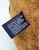 GUND Vintage 1992 GUND Rugby Big Daddy Limited Edition Bear, close-up of the bear's plush fur and care tag.