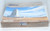 Heritage Puzzles Heritage 550 Piece Jigsaw Puzzle: First Flight Kitty Hawk, NC, image of a puzzle box with a picture of the Wright Brothers' monument in Kitty Hawk, North Carolina.