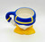 Disney Parks Exclusive Signature Series Mugs - Donald Duck, ceramic mug designed as Donald Duck's body with his signature blue sailor shirt and yellow beak as the base.