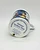 Pillsbury Doughboy Fine Porcelain Collector Mugs: August Summer Vacation Treat, a collectible porcelain mug with a summer vacation theme featuring the Doughboy.