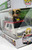 Funko POP! Rides Ghostbusters Ecto-1 With Jillian Holtzmann figure in damaged box, featuring the iconic ghostbusters vehicle and character bobblehead.