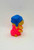 Hasbro Glo Friends Snugbug Mini Figure, colorful collectible toy with a blue hat and pink outfit, designed for children and collectors.