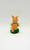 Hanna-Barbera: Scooby-Doo - Scrappy-Doo Wind-Up Figure, back view of an orange dog figurine with a blue collar, sitting on green grass base.