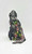 BANDAI Godzilla: Hedorah Smog Monster 6.5" Soft Vinyl Figure, detailed artistic rendering of the iconic monster with a textured surface and vibrant green and pink accents.