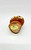 Russ Berrie & Co Russ Berrie Owl Candle, ceramic owl-shaped candle with large eyes and yellow beak, featuring a sticker on the bottom indicating it is made in Hong Kong.