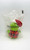 Muppet's McDonald's Happy Meal 1988 Muppet Babies Christmas Kermit Stuffed Animal, green plush toy with a red Santa hat, plaid skirt, and a white pom-pom, in clear plastic packaging.
