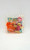 McDonald's Happy Meal Toy: Halloween Pumpkin Birdie Toy Figure, small bird-shaped toy with pumpkin design in bright orange and pink colors.