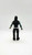 WWE 2011 Jeff Hardy Action Figure (Loose), back view of the figurine displaying the detailed black outfit with colorful arm designs and long black hair.
