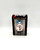Knuckleheadz Toys Twiztid Freek Show Monoxide Half Pint Vinyl Figure, collectible toy in black box with clear window, featuring a horror-themed character with blue dreadlocks, white face paint, blood splatter, black tuxedo, and yellow teeth.