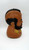 Mr. T 1983 Ruby-Spears Enterprise Mr. T Plastic Blow Mold Bust Bank, detailed side view of a collectible plastic bust of Mr. T with a painted beard, hairstyle, and a yellow decorative accessory on the chest.