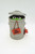 Sesame Street Oscar the Grouch Wind-Up Toy, a small toy in a trash can design with googly eyes, a sign that says 'Go Away!', and a wind-up mechanism on the side.