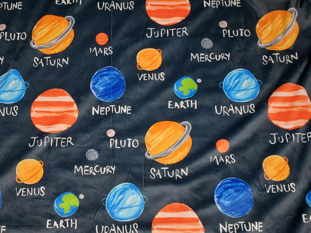 A 40"x60" Solar System Blanket, w/BELLA Orange back. *sample