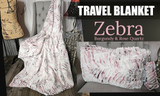 A step ZEBRA Travel Blanket. (45"x60")