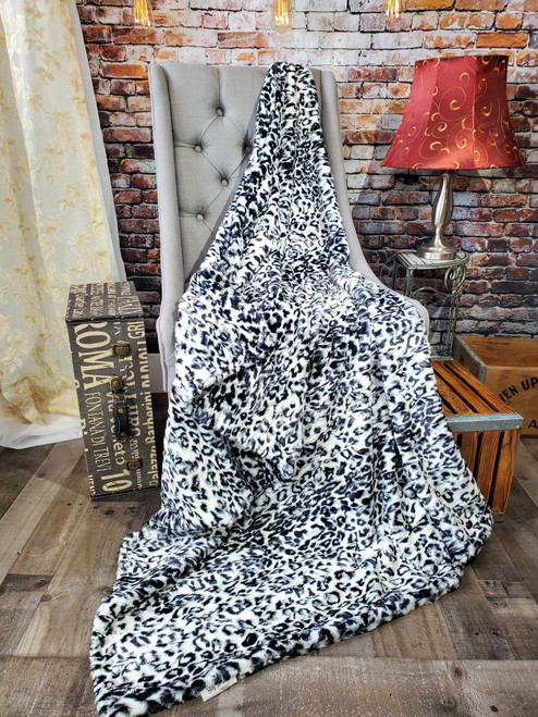 A Snow White JAGUAR Large Throw Blanket. (50"x60")