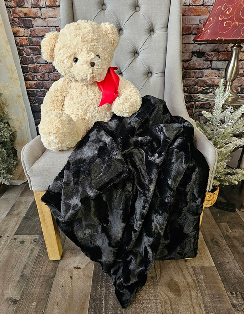 A Black 30"x40" BELLA Kids Blanket. *DEAL