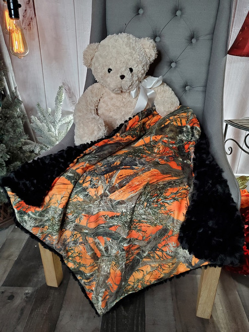 A 28"x28" CAMOUFLAGE Blanket, color is Orange Timber. w/the "GATOR" Minky back. *DEAL