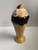 Ceramic ice cream cone with cherry on top