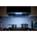 Kitchenaid® Four à micro-ondes à hotte intégrée à profil bas intelligent avec ventilateur double YKMML550RBS