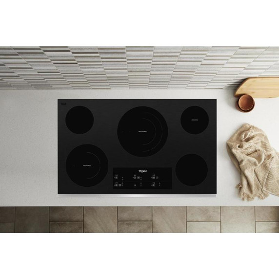 Whirlpool® Table de cuisson électrique en vitrocéramique avec élément radiant triple - 36 po WCE97US6KS