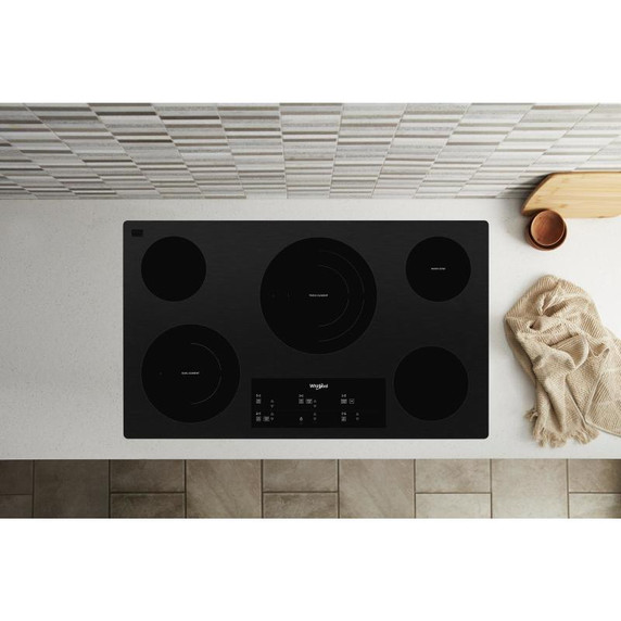 Whirlpool® Réfrigérateur à congélateur supérieur - 24 po - 11.6 pi cu WRT112CZJW