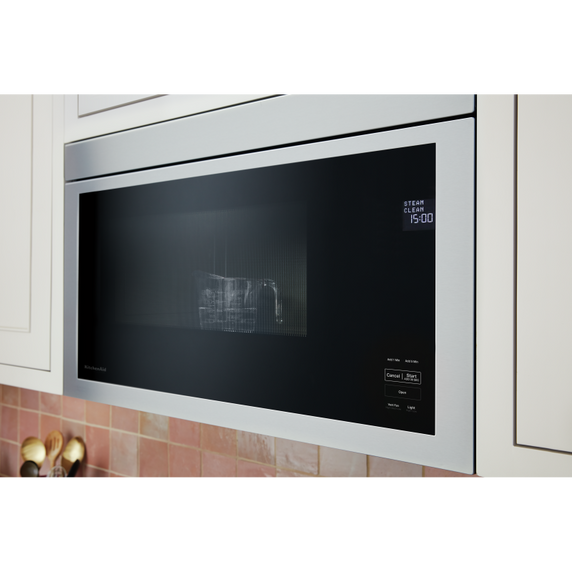 Four à micro-ondes à hotte intégrée au design encastré affleurant KitchenAid® YKMMF330PPS