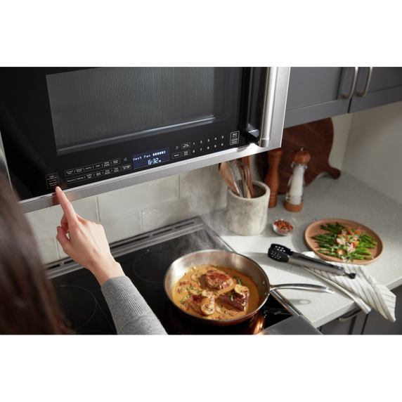 Four à micro-ondes à convection et hotte intégrée  avec mode de friture à air KitchenAid® YKMHC319LPS