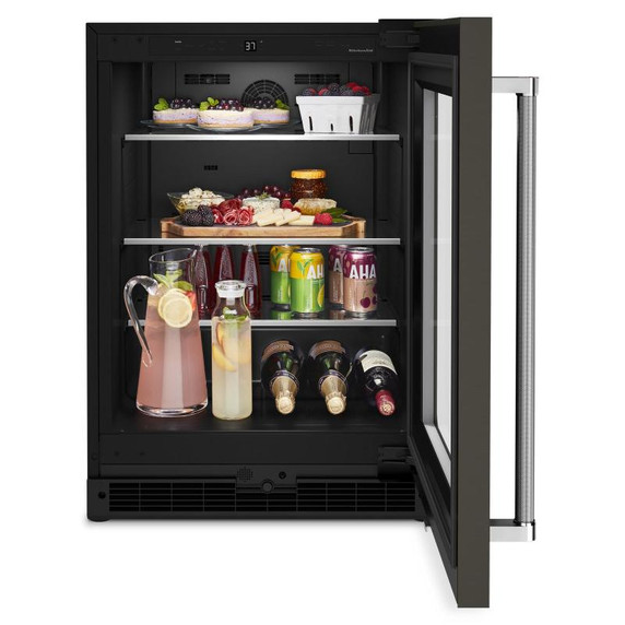 Kitchenaid® Réfrigérateur sous le comptoir avec porte en verre et tablettes à accents métalliques et fini PrintShield™ - 24 po KURR314KBS
