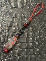 Two-Tone Red & Black Diamond Paracord Knife Lanyard with Black Skull Bead and Handmade Lava Flow Carbon Fiber Bead