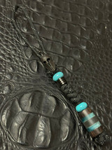 Ebony Wood, Turquoise Resin, and Silver Carbon Fiber Split Bead Resin On Black & Reflective Spec Paracord Accented by Turquoise and Black Metal Spartan Helmet Bead