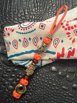 Nautical Themed Brass Octopus Skull & Anchor Bead Lanyard with Multi-Color Infinity Bead and Tan Cobra Knot Wrap Over Orange Paracord