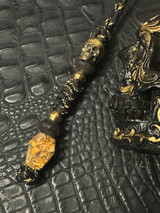 Coffin Collection Gold Flake & Shredded Money Resin Bead On Reactive Black/Gold Cord with Polished Brass Skull and Lava Rock Accents