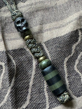 Jungle Camo Paracord Tactical Style Knife Lanyard with Black Carbon Fiber and OD Green G10 Bead, Black Metal Skull Bead, and Brass Accents
