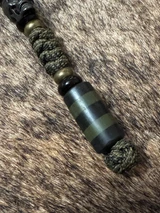 RESERVED - Jungle Camo Paracord Tactical Series Knife Lanyard with Black Skull, Carbon Fiber, and OD Green Layered Bead Accented by Brass