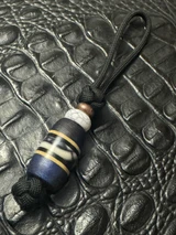 Custom Knife Nub with Dyed Blue Curly Maple, Tan G10, Black G10, and Wooly Mammoth Split Layer Bead Accented by White Turquoise & Copper