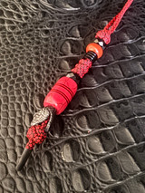 "Snake Charmer" Knife Lanyard with 9 Layer Red/Black Web Tru-Stone, Black G10, and Red G10 Split Bead Accented by Black Snakehead Bead, Red Jasper, and Heat Shrink Tips