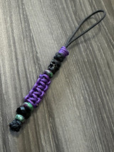 Black Mini Cord Knife Lanyard with Two-Faced Metal Skull, Purple Mini Cord Wrap, Black Faceted Bead and Multi-Color Spacer Accents