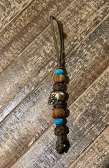Large Brass Skull Bead Knife Lanyard with Polished Olive Wood, Turquoise, and Brass Accents On Coyote Brown Paracord