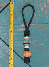 Olive Wood, Turquoise, and Blue Glow Bead Knife Lanyard On Black Paracord