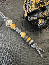 Ebony and Deep Yellow Swirl Resin Split Bead Knife Lanyard with Silver EDC Compass Bead on Black/Gray Paracord