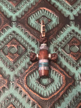 Copy of Handmade Snakewood, Mother of Pearl Resin, and Dyed Curly Maple Cross Pendant with Antler Passthrough Ring