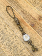 Gnarly Bark Collection Cross Cut Deer Antler Medallion Knife Lanyard with Brass Skull Chief, Black Faceted Beads, Brass Spacers, and End Accents