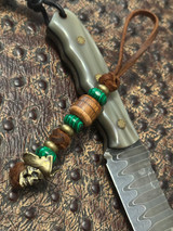 Rustic Brown Lace Leather Knife Lanyard with Handcrafted Wood Layer Bead, Malachite Spacers, and Brass Pirate Skull