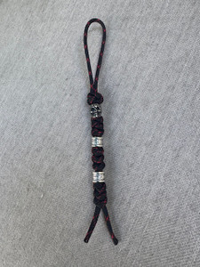 Red and Black Paracord Knife Lanyard with Skull Bead and Polished Tribal Beads Red and Black Paracord Knife Lanyard with Skull Bead and Polished Tribal Beads