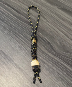 Black and Gold Paracord Loop Lanyard with Polished Gold Finished Beads and Handmade Elk Antler Bead Black and Gold Paracord Loop Lanyard with Polished Gold Finished Beads and Handmade Elk Antler Bead